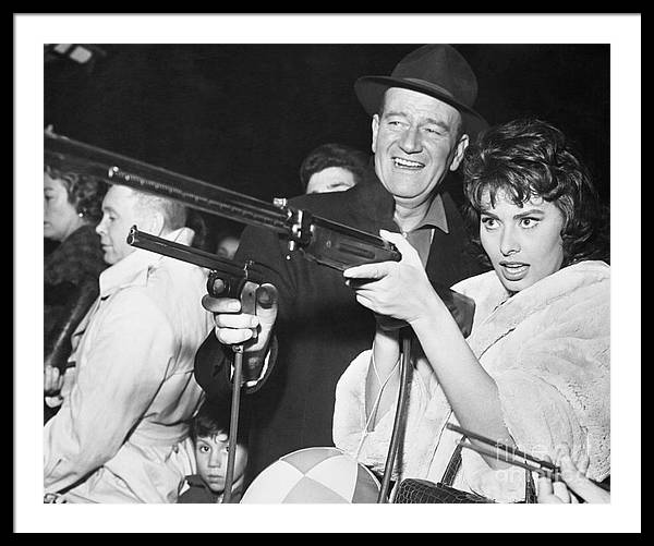 john-wayne-and-sophia-loren-gun-play-bettmann.jpg